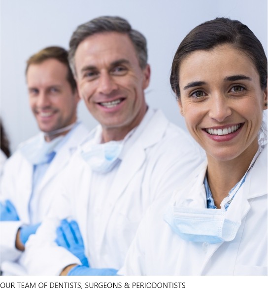 team of dentists smiling together