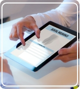 dentist holding tablet